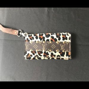 Calf hair Louis Vuitton wristlet